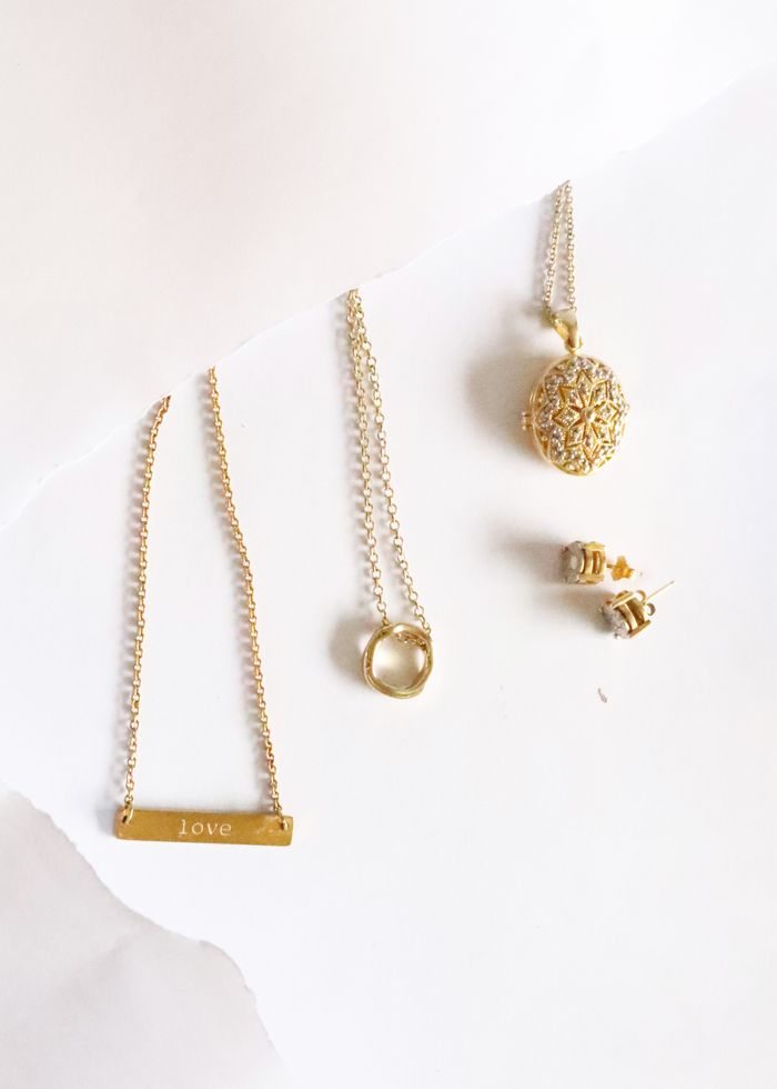 The Art of Drawing Readers In: Your attractive post title goes here Beautiful assortment of gold jewelry including necklaces, earrings, and pendants.
